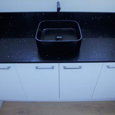 custom-vanity-with-UBS-black-granite-top-and-basin-after-Copy
